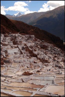 Salineras de Maras surrounded by mountains - Peru